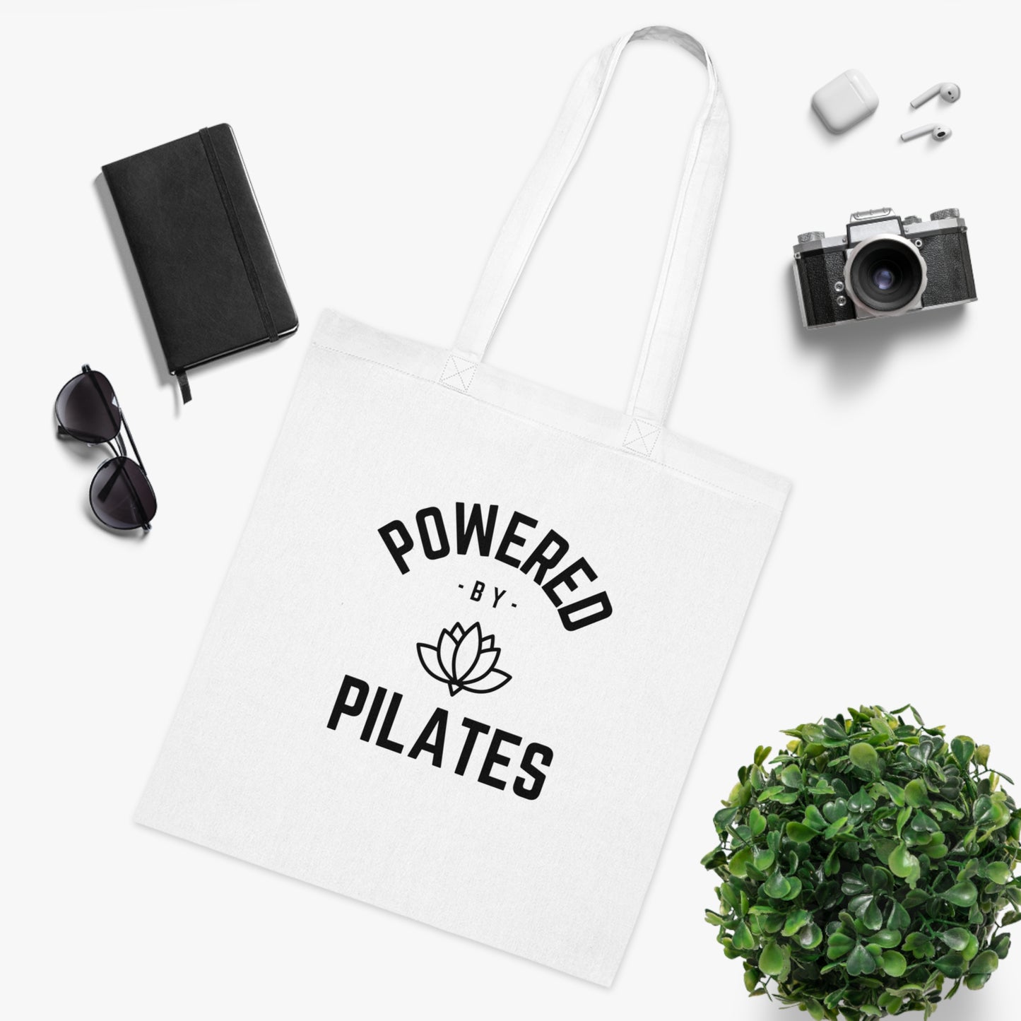 Powered by Pilates Yoga Slogan cotton tote bag, for pilates, yoga, fitness, well-being, wellness, mindfulness, bold, activewear, athleisure, statement tote bag