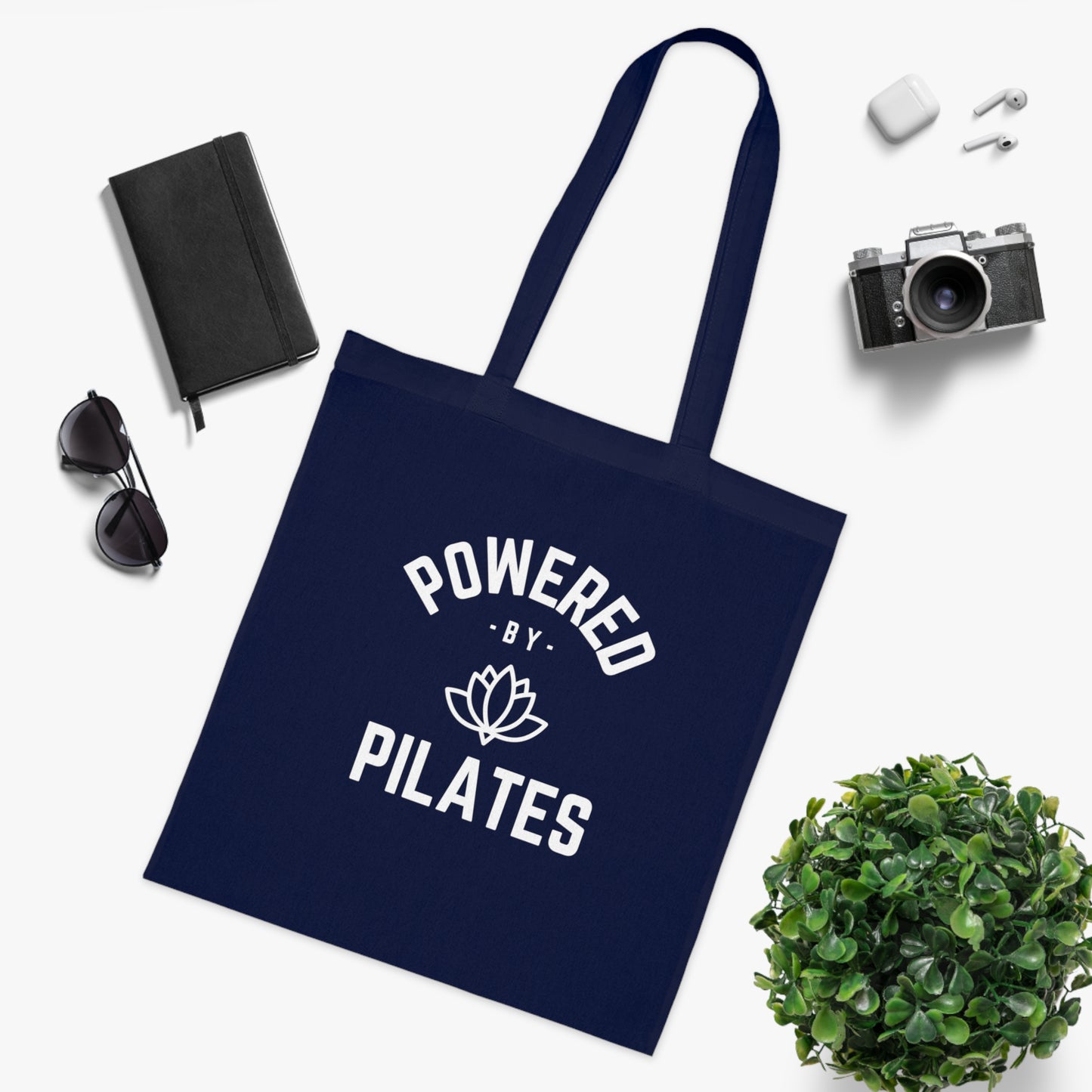 Powered by Pilates Yoga Slogan cotton tote bag, for pilates, yoga, fitness, well-being, wellness, mindfulness, bold, activewear, athleisure, statement tote bag