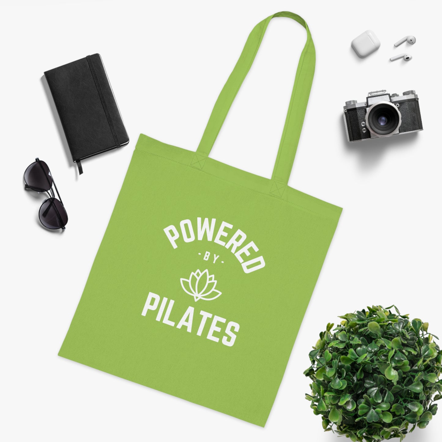 Powered by Pilates Yoga Slogan cotton tote bag, for pilates, yoga, fitness, well-being, wellness, mindfulness, bold, activewear, athleisure, statement tote bag