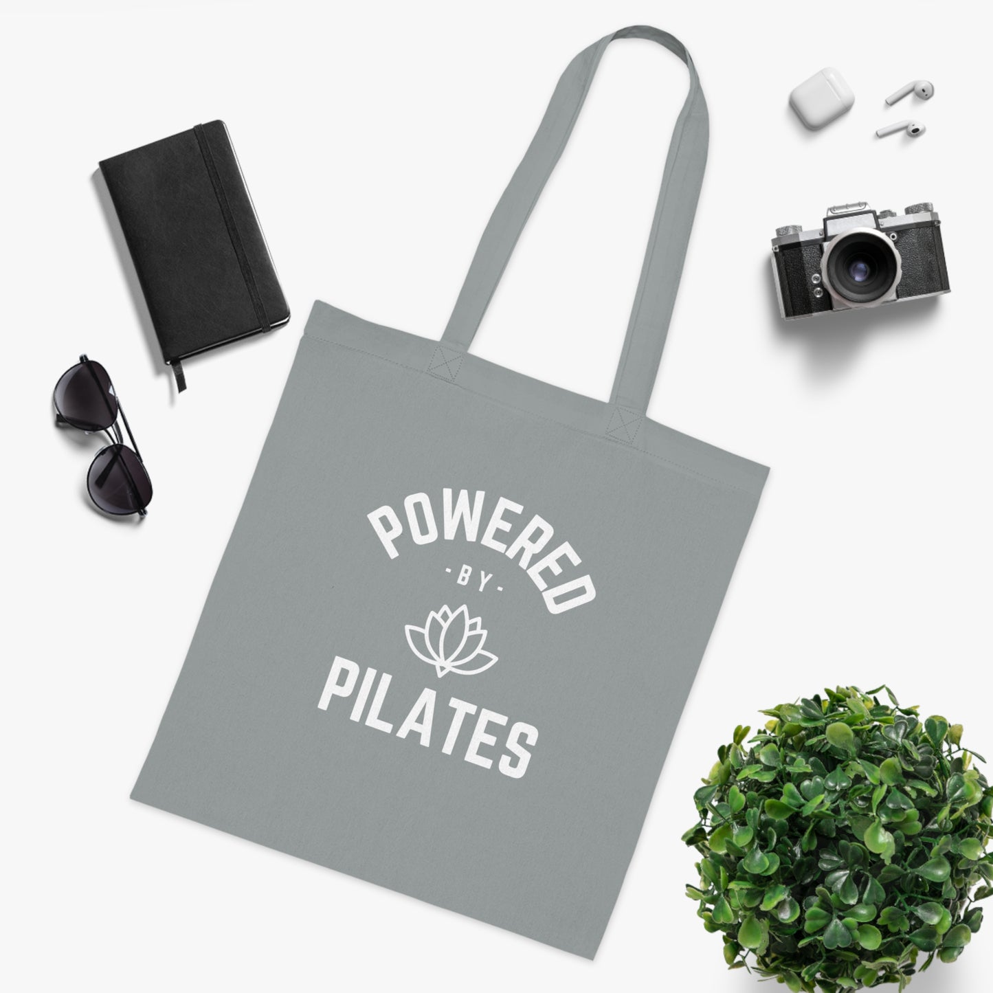 Powered by Pilates Yoga Slogan cotton tote bag, for pilates, yoga, fitness, well-being, wellness, mindfulness, bold, activewear, athleisure, statement tote bag