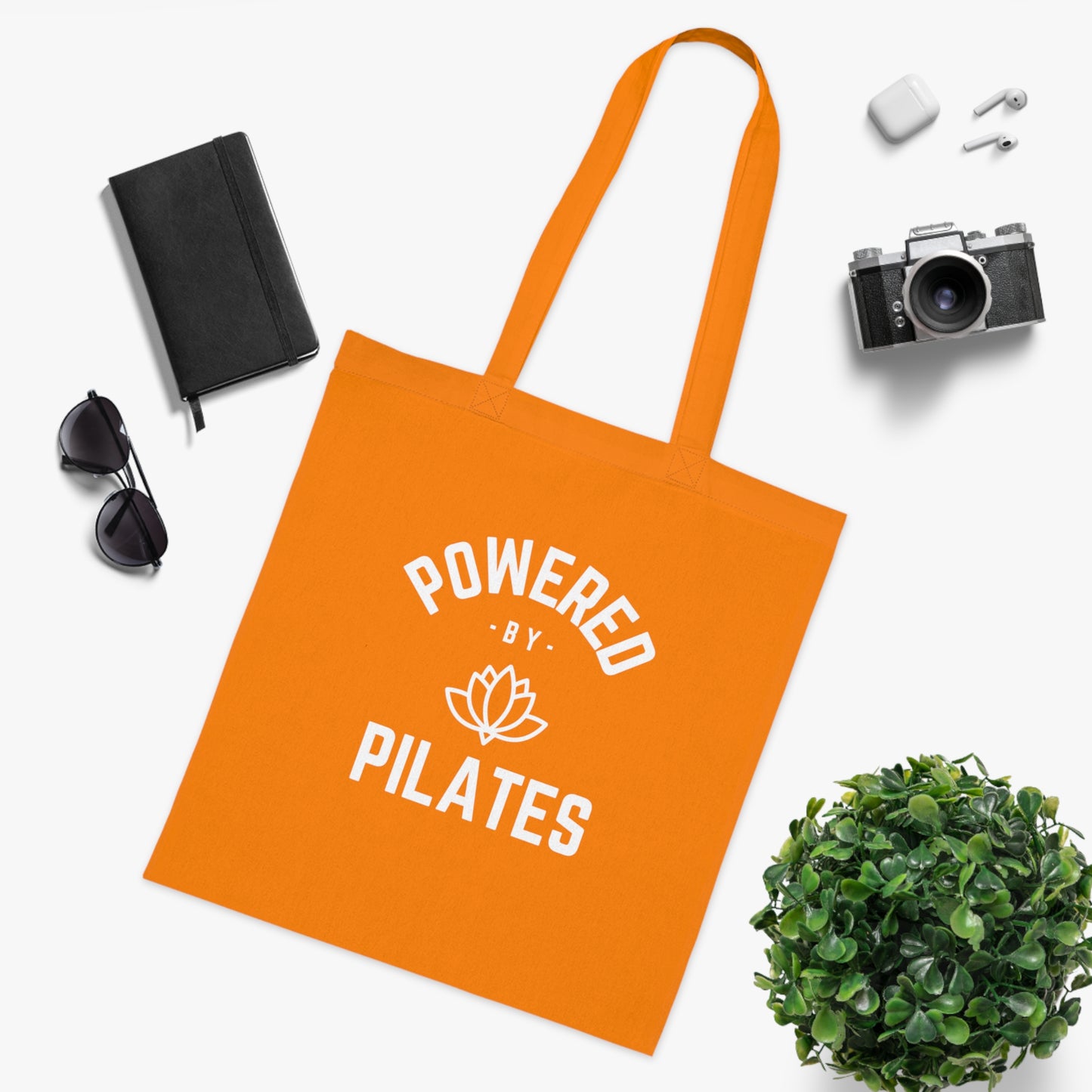 Powered by Pilates Yoga Slogan cotton tote bag, for pilates, yoga, fitness, well-being, wellness, mindfulness, bold, activewear, athleisure, statement tote bag