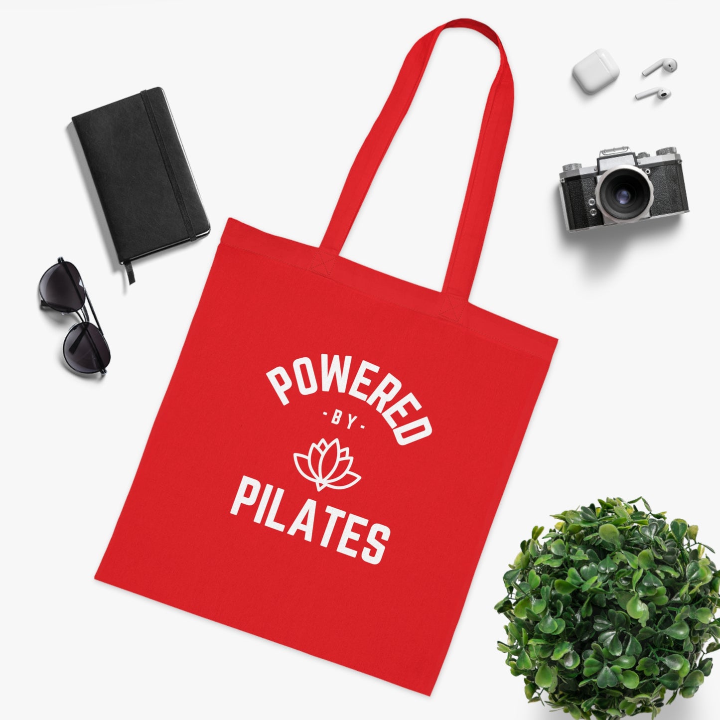 Powered by Pilates Yoga Slogan cotton tote bag, for pilates, yoga, fitness, well-being, wellness, mindfulness, bold, activewear, athleisure, statement tote bag