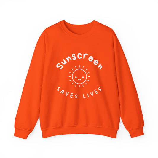 Bold Sunscreen Saves Lives slogan sweatshirt, with smiley sun graphic, for anti-aging fashion, SPF awareness, safe sun, sunscreen, skin protection, sun protection statement top