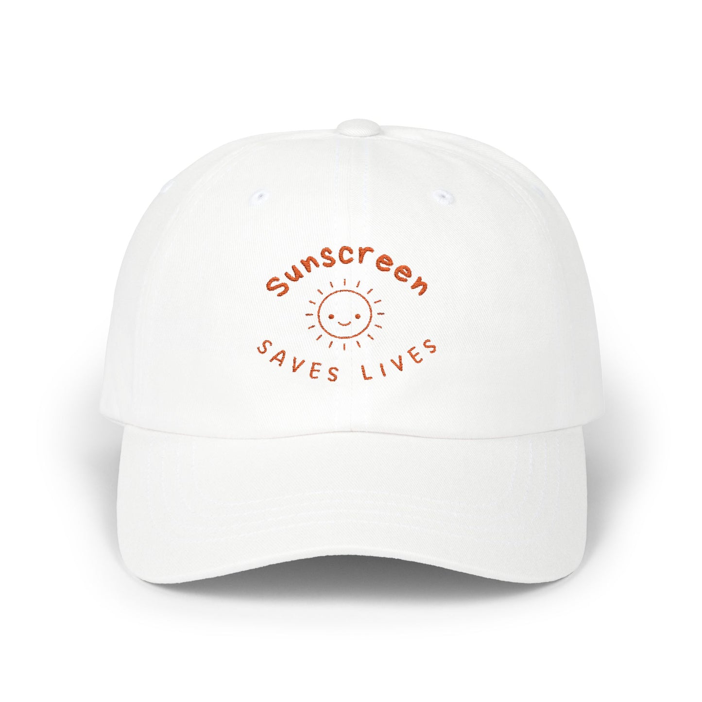 Bold Sunscreen Saves Lives slogan baseball cap, with smiley sun graphic, for anti-aging fashion, SPF awareness, safe sun, sunscreen, skin protection, sun protection statement hat